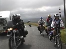 Competing with the traffic on the long downhill near Rough Rigg, Harwood, 3.7 miles from the hostel